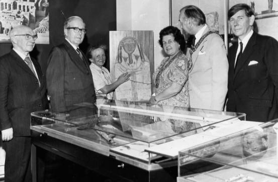 The opening of the Wellcome Museum in the Classics Department. Right to left: Harry James, the Mayor and Mayoress of Swansea, Kate Bosse-Griffiths, Principal Steel, Gwyn Griffiths. 